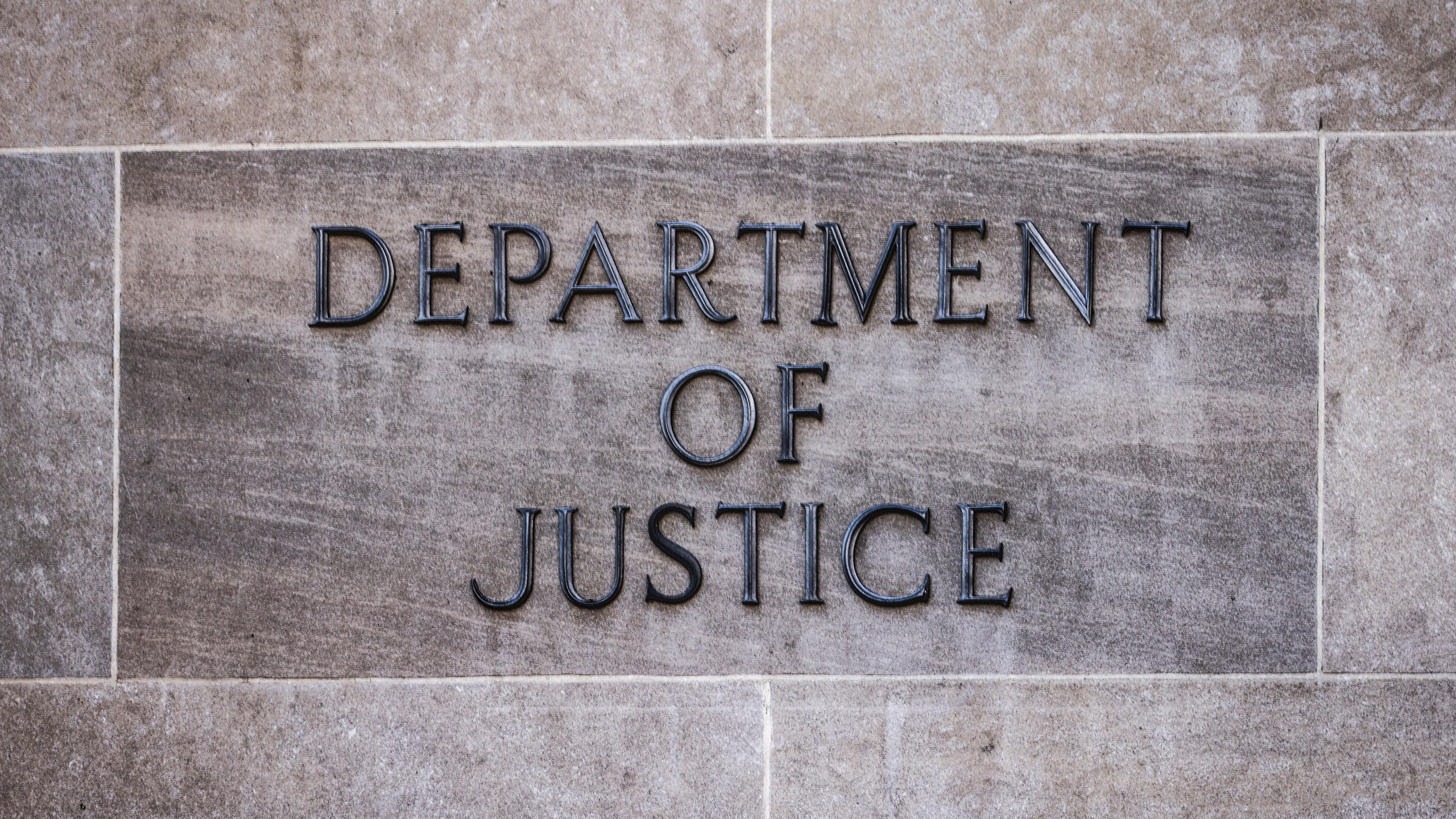 Department of Justice inscription is seen on at the headquarters building in Washington, D.C.,