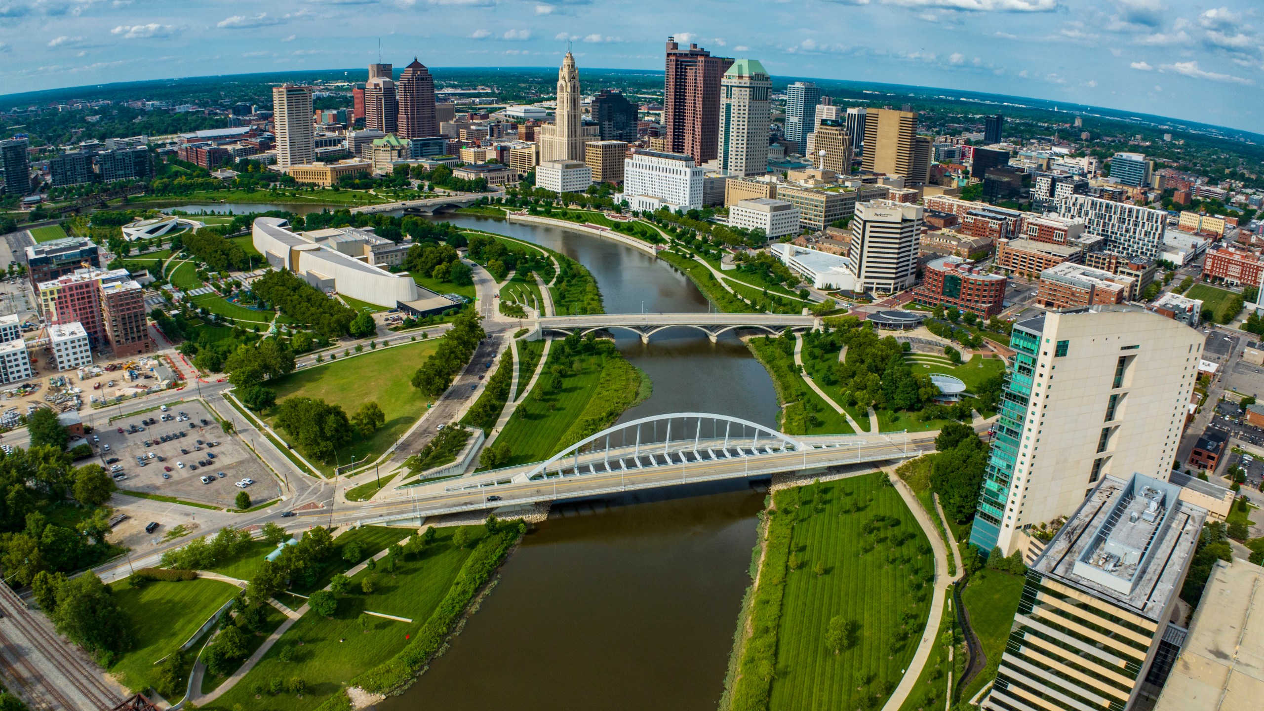 Skyline view of bridges crossing Scioto River that runs through Columbus, Ohio.