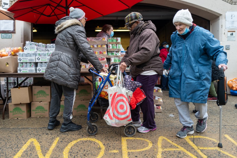 Free food is distributed to residents in need at a weekly food bank in Brooklyn, New York.