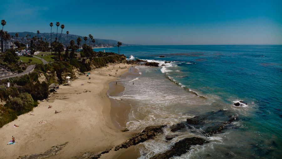 Aerial views of white sandy beaches of Laguna Beach, California.