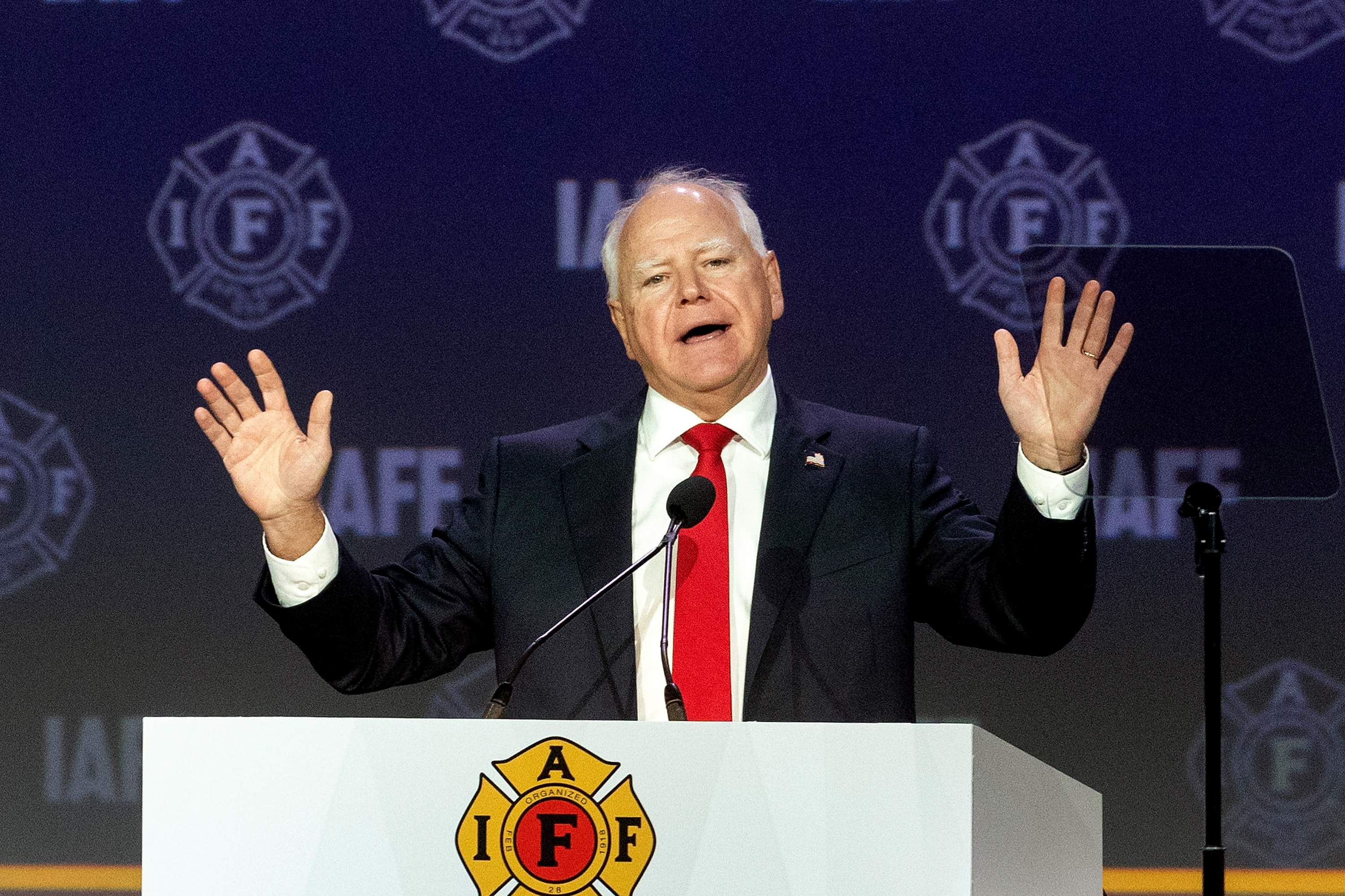 Vice presidential nominee, Minnesota Gov. Tim Walz speaks on stage during the International Association of Fire Fighters (IAFF) Convention on August 28, 2024