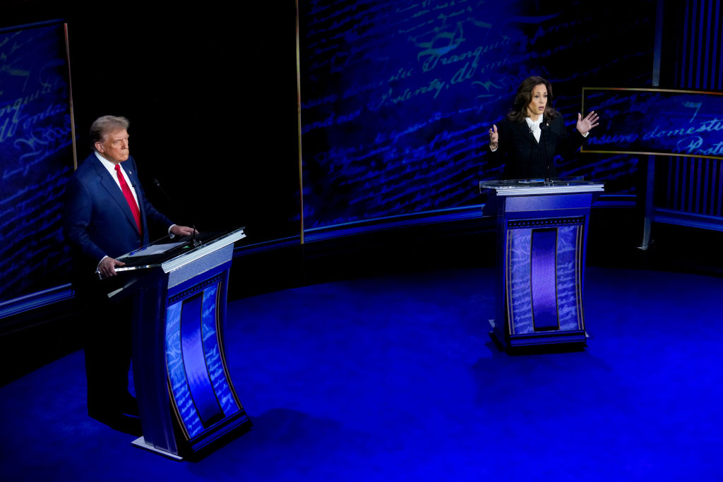 A picture of Kamala Harris and Donald Trump on stage during their first debate.