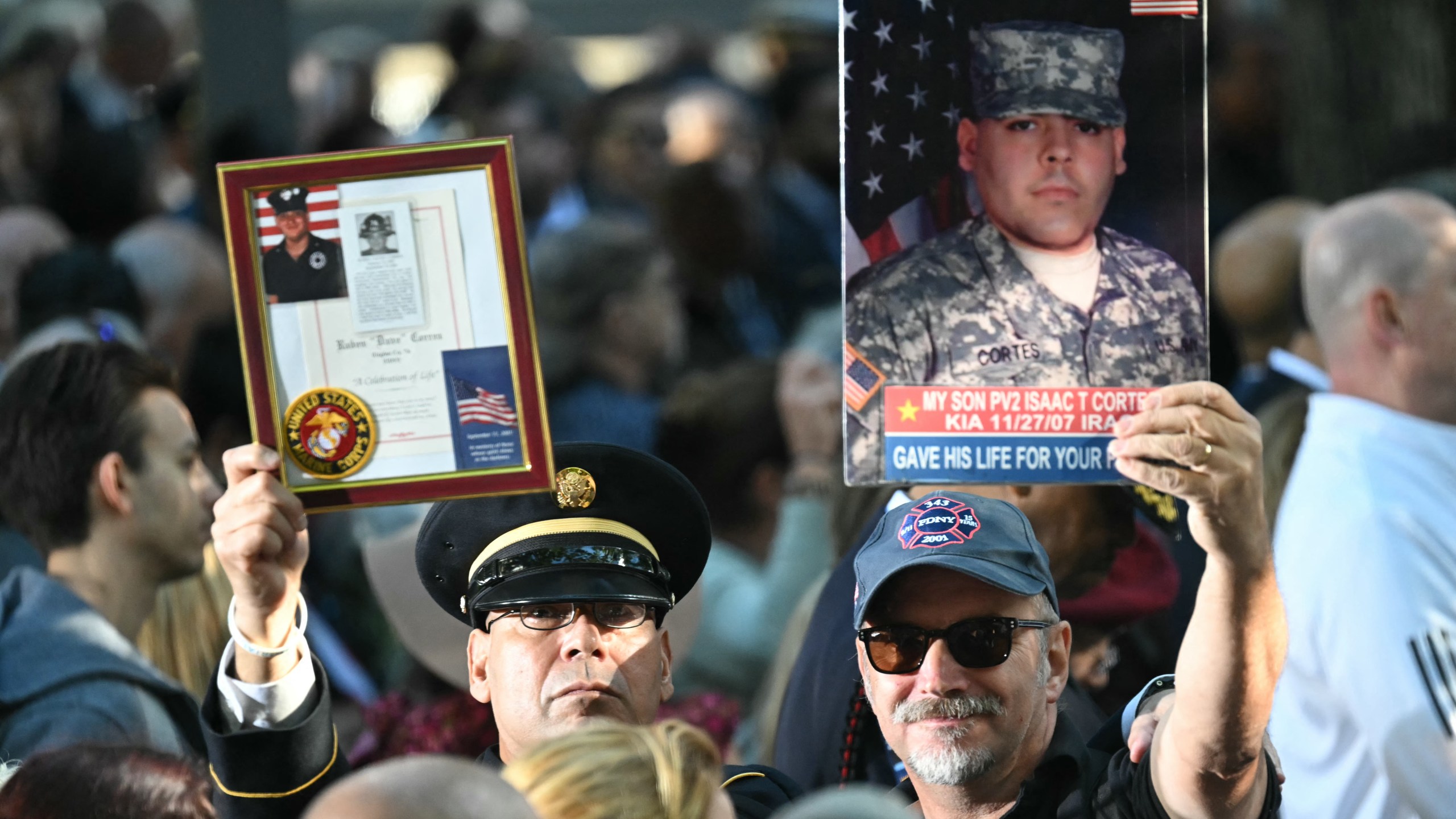 People attend a remembrance ceremony on the 23rd anniversary of the September 11 terror attack on the World Trade Center at Ground Zero, in New York City on September 11, 2024.