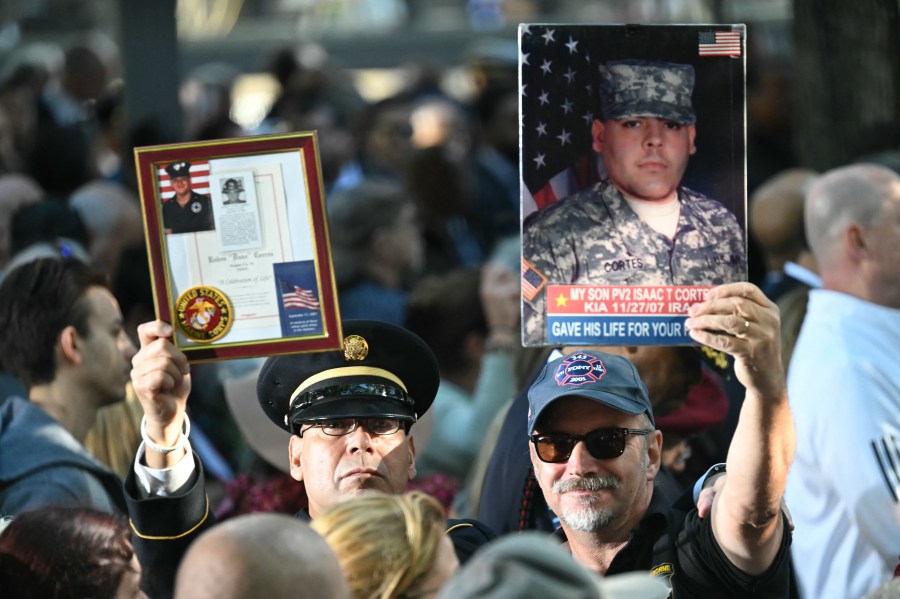 People attend a remembrance ceremony on the 23rd anniversary of the September 11 terror attack on the World Trade Center at Ground Zero, in New York City on September 11, 2024.