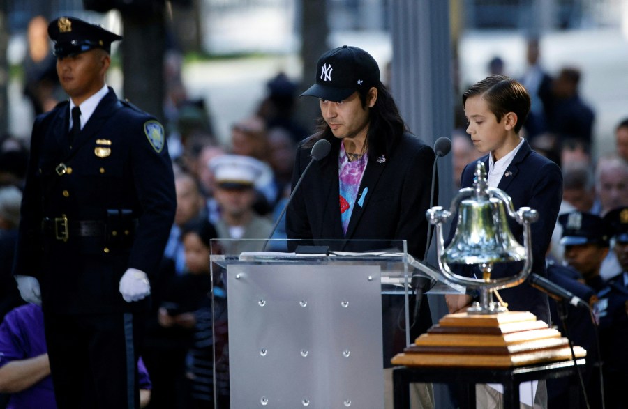 The names of the victims of the 9/11 terror attack are read during a remembrance ceremony on the 23rd anniversary of the September 11 terror attack on the World Trade Center at Ground Zero, in New York City on September 11, 2024. 