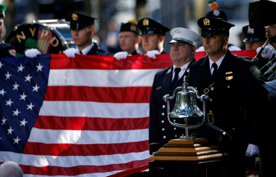 The names of the victims of the 9/11 terror attack are read during a remembrance ceremony on the 23rd anniversary of the September 11 terror attack on the World Trade Center at Ground Zero, in New York City on September 11, 2024. 