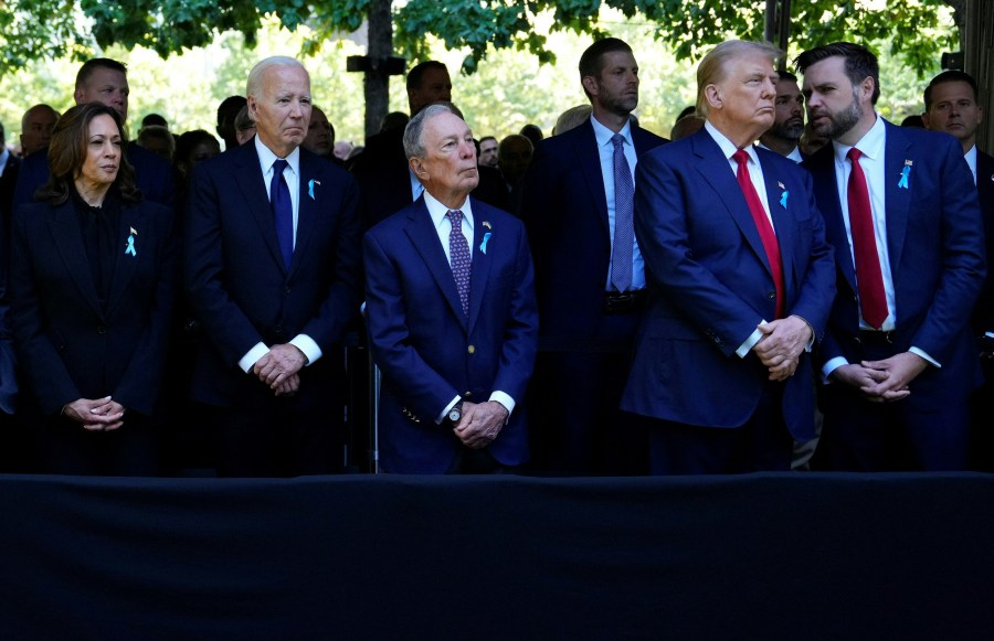 (L to R) US Vice President and Democratic presidential candidate Kamala Harris, US President Joe Biden, former Mayor of New York Michael Bloomberg and former US President and Republican presidential candidate Donald Trump attend a remembrance ceremony on the 23rd anniversary of the September 11 terror attack on the World Trade Center at Ground Zero, in New York City on September 11, 2024. 