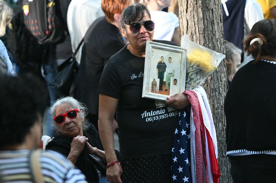 People attend a remembrance ceremony on the 23rd anniversary of the September 11 terror attack on the World Trade Center at Ground Zero, in New York City on September 11, 2024. 