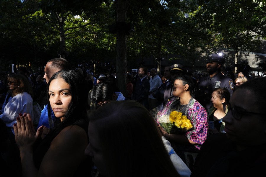 People attend a remembrance ceremony on the 23rd anniversary of the September 11 terror attack on the World Trade Center at Ground Zero, in New York City on September 11, 2024. 