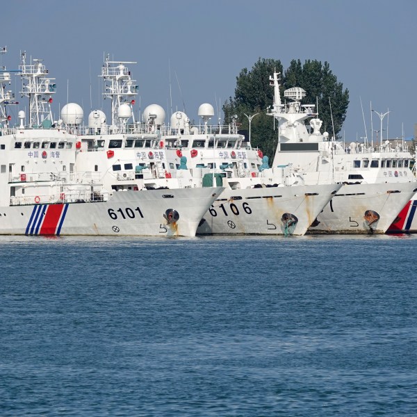 Coast guard ships are seen at a dock in Yantai, China, on September 26, 2024.