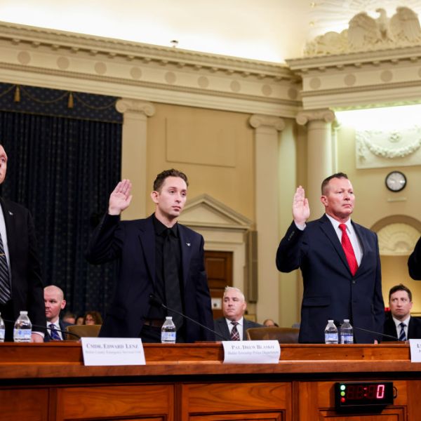 Edward Lenz, sergeant at the Adams Township Police Department and commander of the Butler County Emergency Services Unit, from left, Drew Blasko, patrolman of the Butler Township Police Department, John Herold, Pennsylvania State Police lieutenant, and Patrick Sullivan, former US Secret Service agent, are sworn in during a hearing with the full task force on the assassination attempt of former President Donald J. Trump in Butler, Pennsylvania, on Capitol Hill in Washington, DC, US, on Thursday, Sept. 26, 2024.