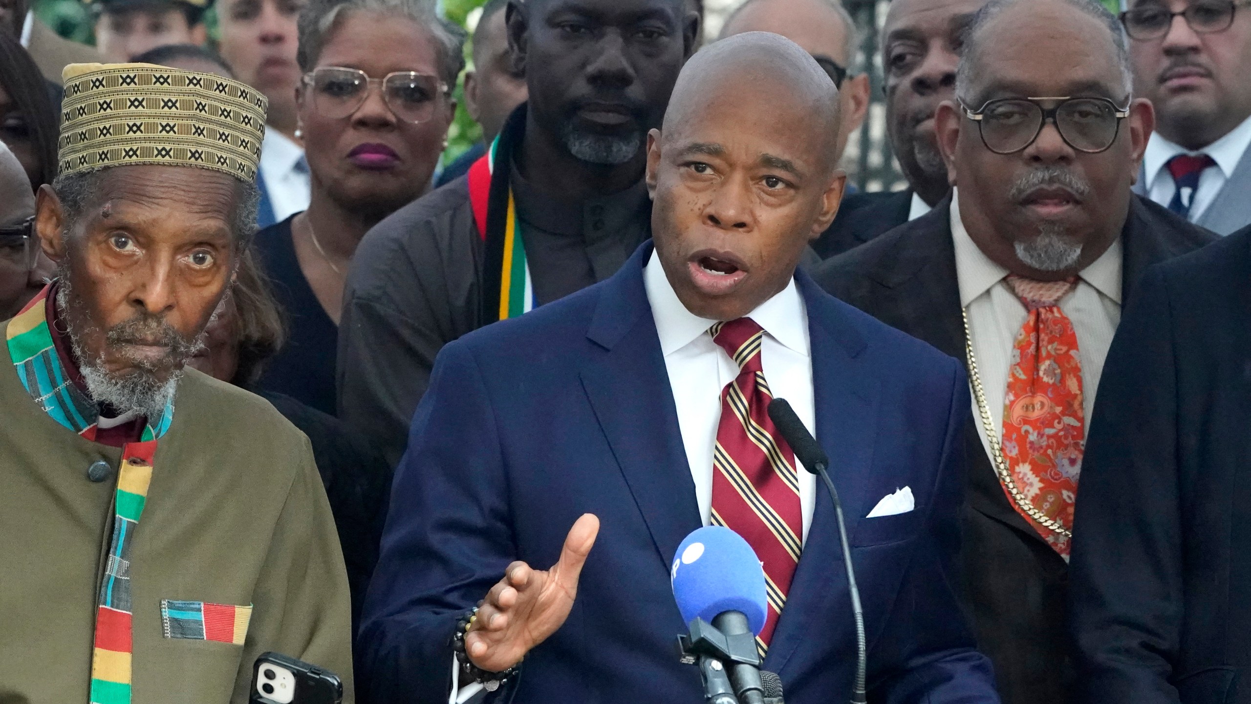 New York City Mayor Eric Adams talks to the press outside Gracie Mansion.