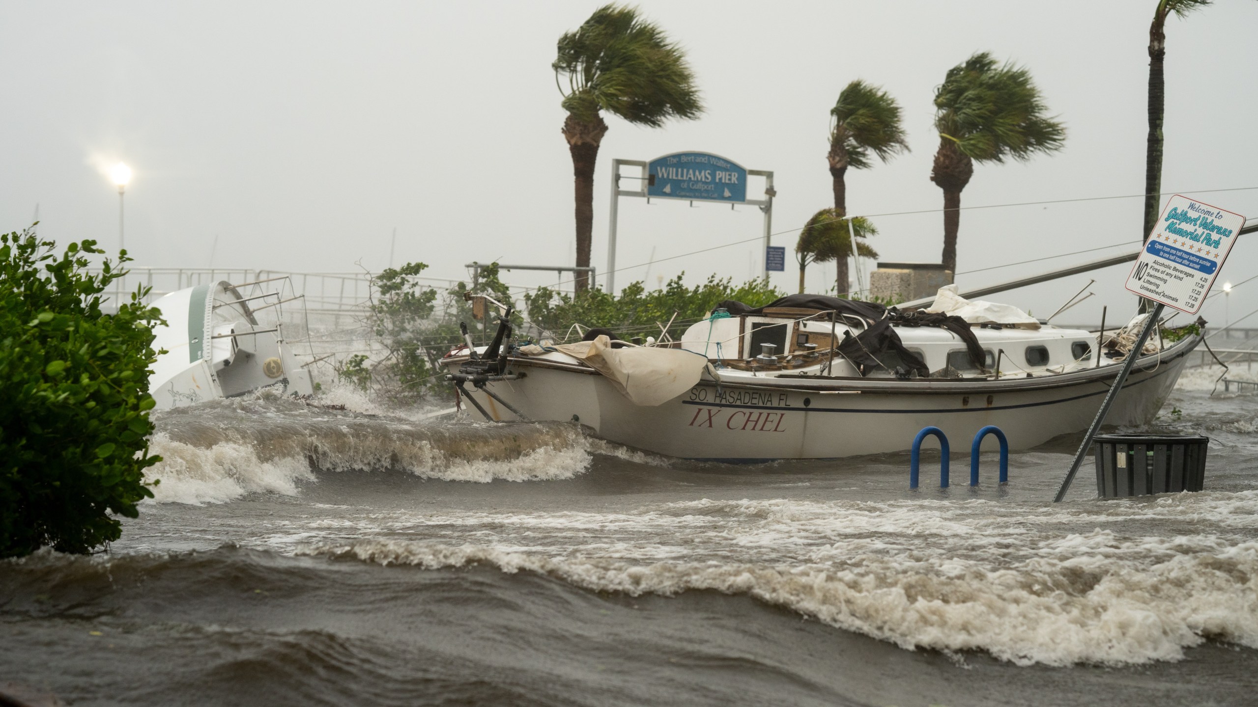 A boat washed ashore as storm surge affects Gulfport, Fla. as Hurricane Helene passed through the Gulf of Mexico to the West on September 26, 2024.