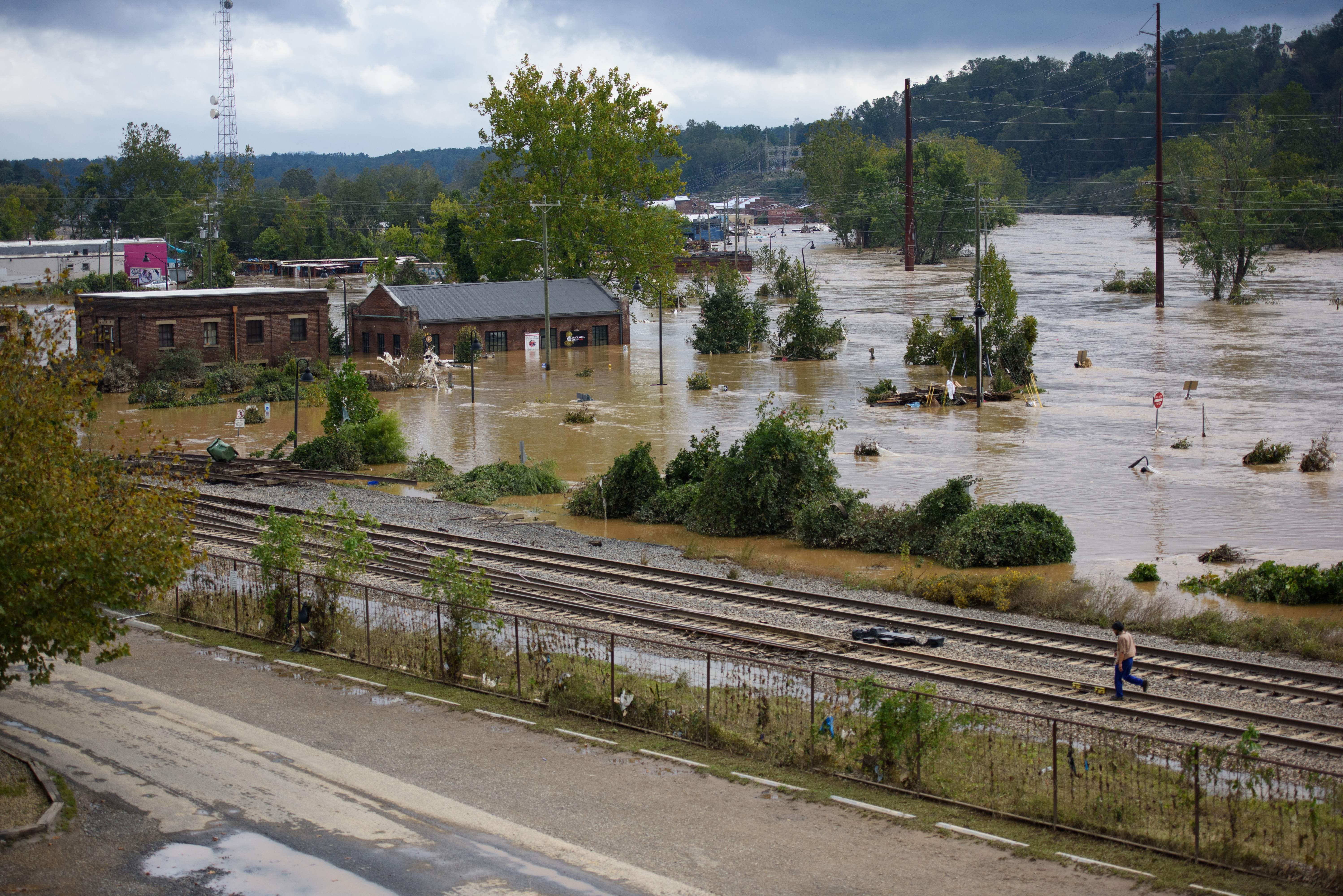 Flooded areas of Asheville, North Carolina, are depicted.