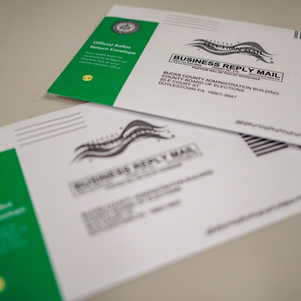 Mail-in ballots are displayed during a processing demonstration at the Board of Elections office on September 30, 2024 in Doylestown, Pennsylvania