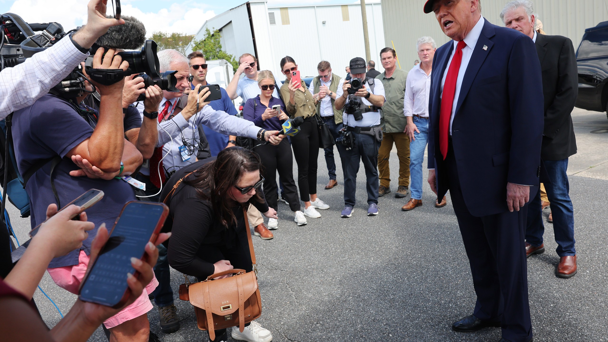 Donald Trump talks to reporters on Sept. 30, 2024 in Valdosta, Georgia.