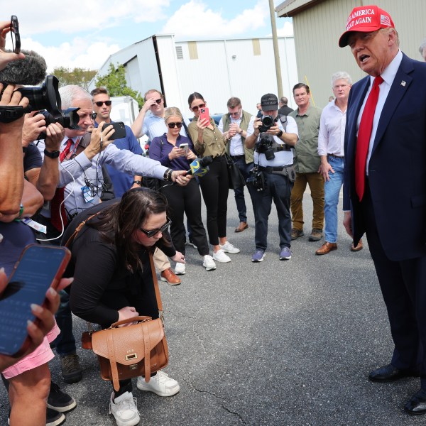 Donald Trump talks to reporters on Sept. 30, 2024 in Valdosta, Georgia.