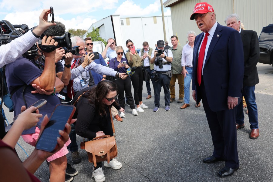 Donald Trump talks to reporters on Sept. 30, 2024 in Valdosta, Georgia.