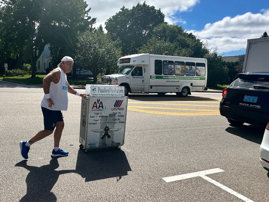 Former flight attendant Paul Veneto pushes an airline drink cart along the routes of the four airplanes hijacked on Sept. 11, 2001.