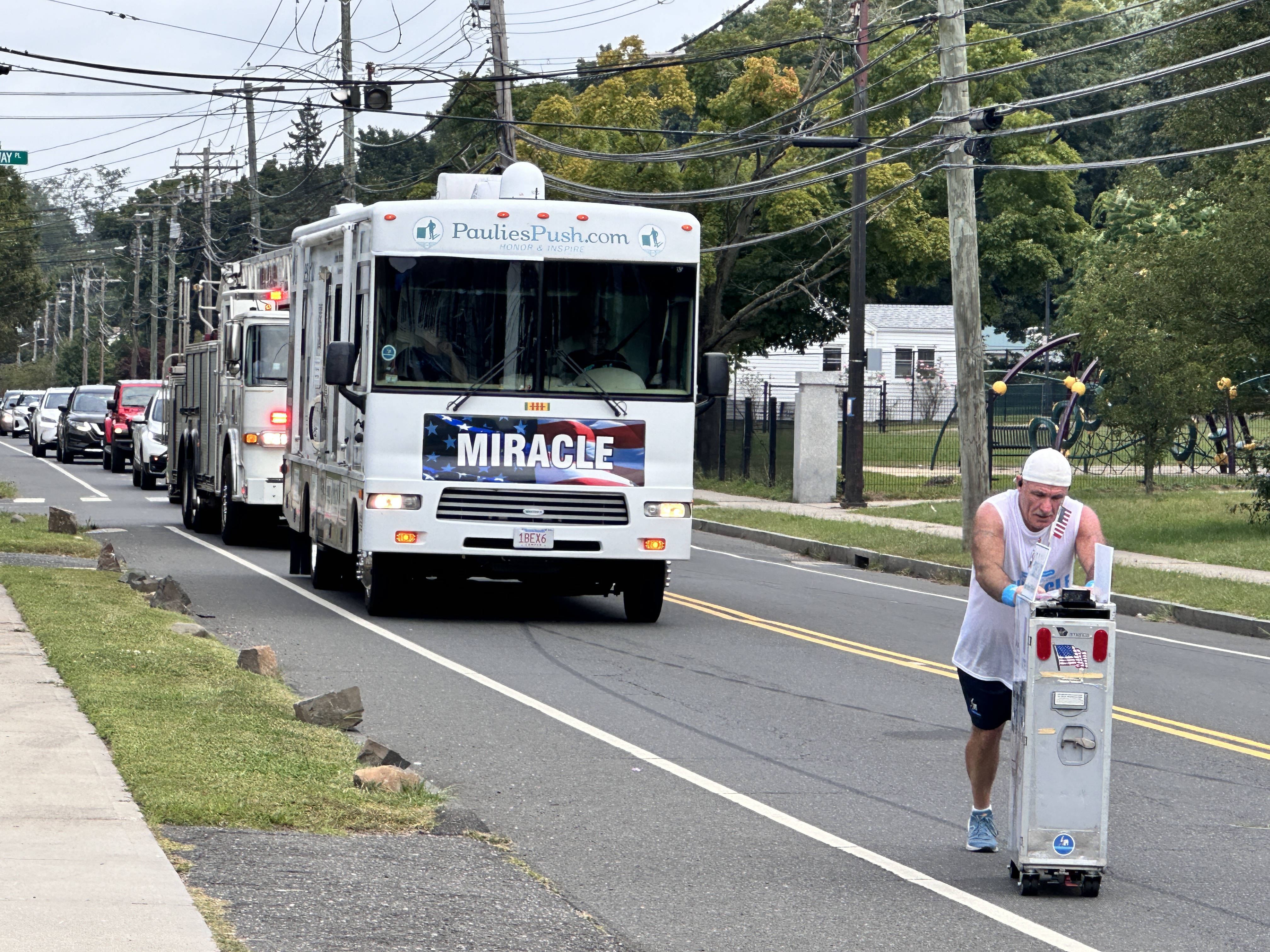 Former flight attendant Paul Veneto pushes an airline drink cart along the routes of the four airplanes hijacked on Sept. 11, 2001.