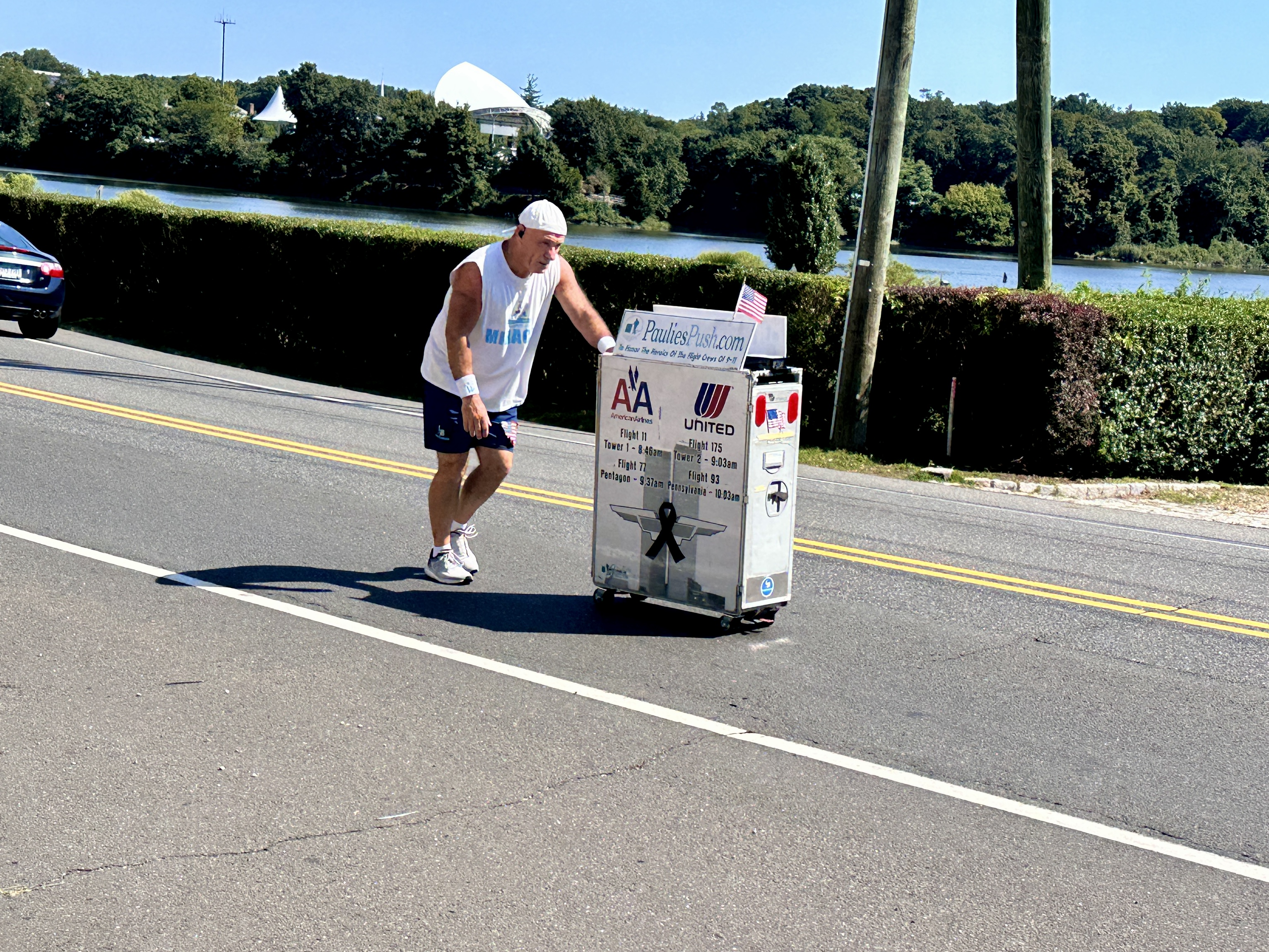 Former flight attendant Paul Veneto pushes an airline drink cart along the routes of the four airplanes hijacked on Sept. 11, 2001.