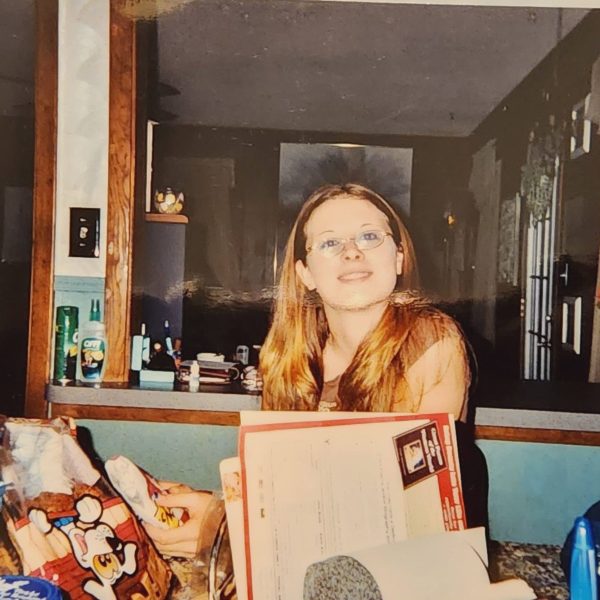 A candid photo of a teenage girl with blondish-brown hair.