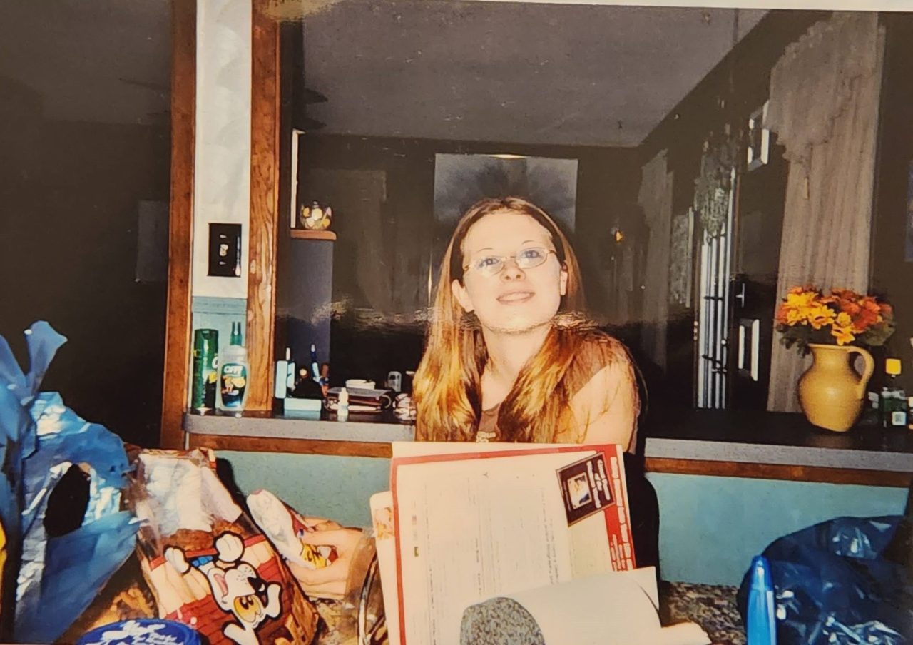 A candid photo of a teenage girl with blondish-brown hair.