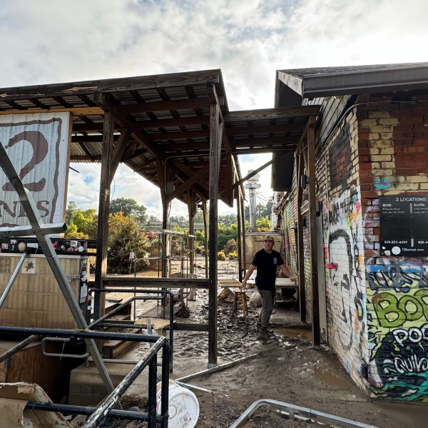 A post-hurricane shot of the damaged exterior of 12 Bones Smokehouse and Brewery in Asheville, North Carolina.