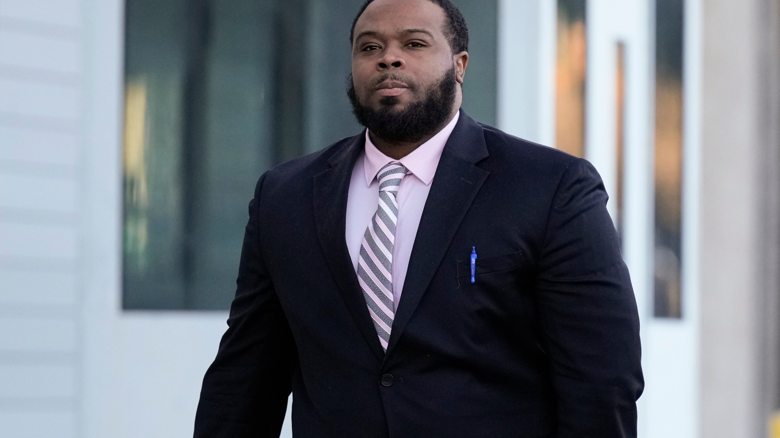 Demetrius Haley, one of three former Memphis police officers charged in the 2023 fatal beating of Tyre Nichols, arrives at the federal courthouse for the day's proceedings Wednesday, Oct. 2, 2024, in Memphis, Tenn. (AP Photo/George Walker IV)