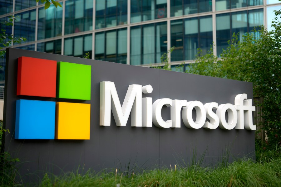 FILE - The Microsoft logo is displayed outside its French headquarters in Issy-les-Moulineaux, outside Paris, May 13, 2024. (AP Photo/Thibault Camus, File)