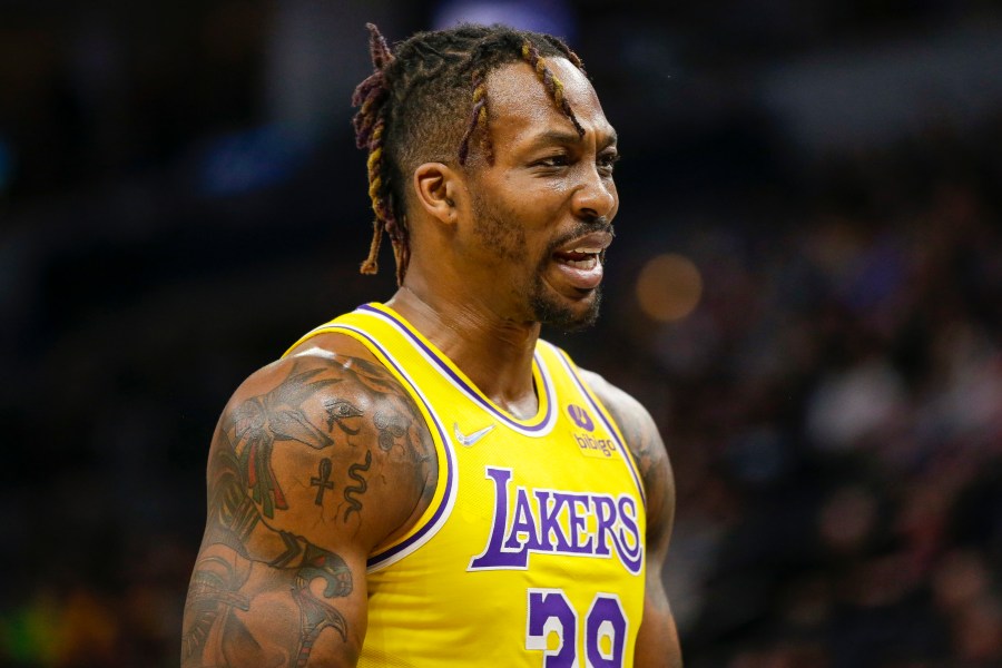 FILE - Los Angeles Lakers center Dwight Howard looks on during an NBA basketball game against the Minnesota Timberwolves, March 16, 2022, in Minneapolis. (AP Photo/Andy Clayton-King, File)