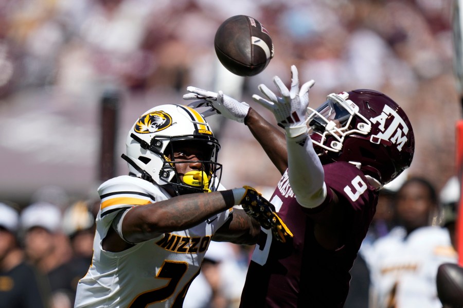 Missouri cornerback Nicholas Deloach Jr. (24) breaks up a pass intended for Texas A&M wide receiver Jahdae Walker (9) during the first half of an NCAA college football game Saturday, Oct. 5, 2024, in College Station, Texas. (AP Photo/Eric Gay)