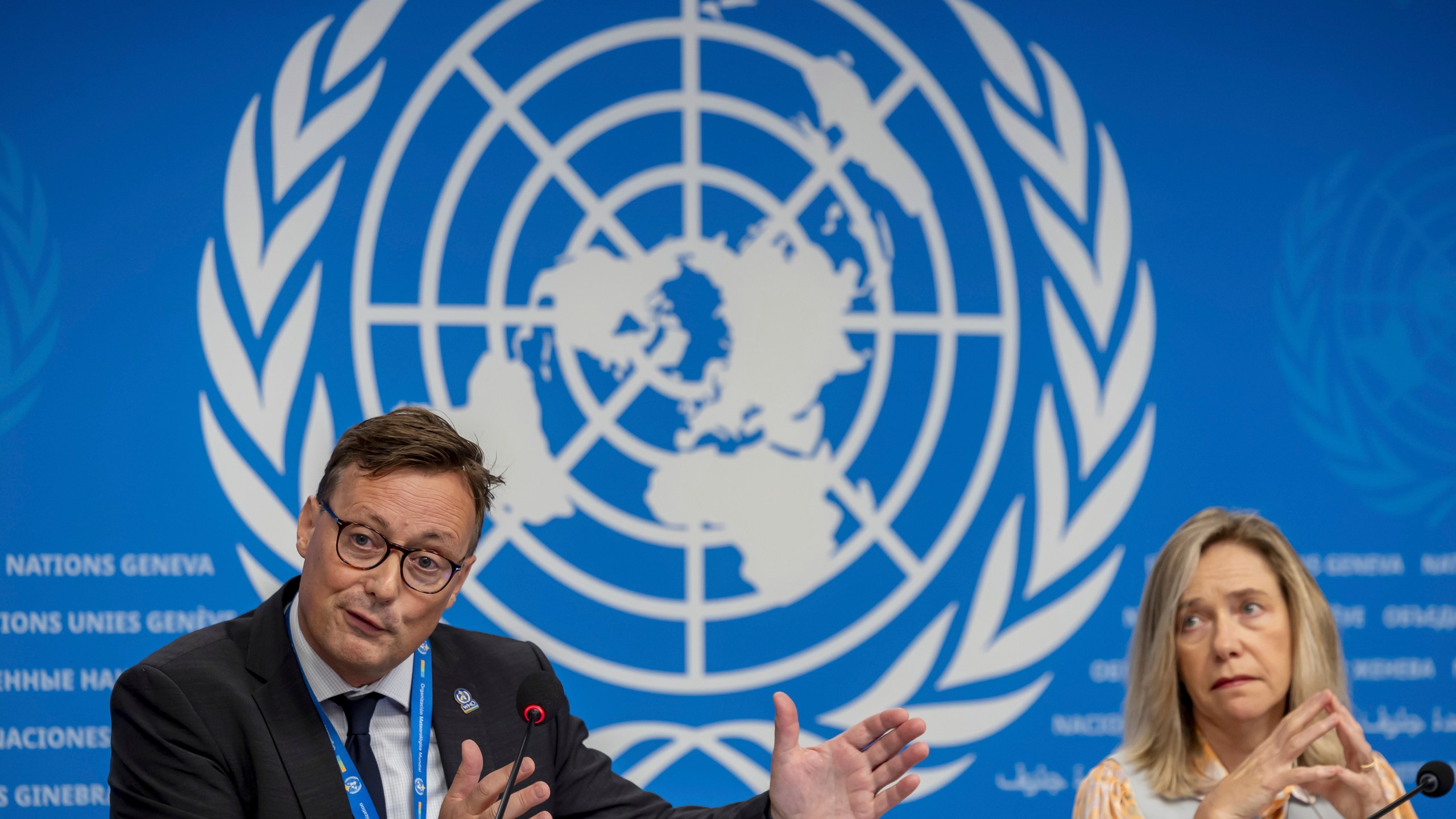 Stefan Uhlenbrook, left, director of Hydrology, Water and Cryosphere at the World Meteorological Organization (WMO), sits next to WMO Secretary-General Celeste Saulo as he presents the WMO's State of Global Water Resources report during a press conference at the European headquarters of the United Nations in Geneva, Switzerland, Monday, Oct. 7, 2024. (Salvatore Di Nolfi/Keystone via AP)