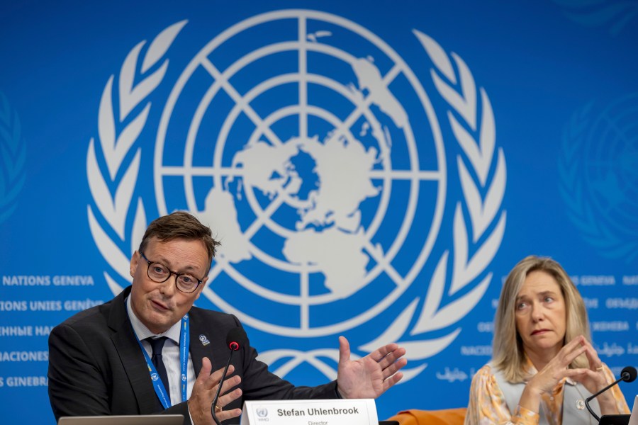 Stefan Uhlenbrook, left, director of Hydrology, Water and Cryosphere at the World Meteorological Organization (WMO), sits next to WMO Secretary-General Celeste Saulo as he presents the WMO's State of Global Water Resources report during a press conference at the European headquarters of the United Nations in Geneva, Switzerland, Monday, Oct. 7, 2024. (Salvatore Di Nolfi/Keystone via AP)