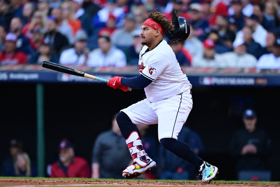 Cleveland Guardians' Josh Naylor doubles in the fifth inning during Game 2 of baseball's AL Division Series against the Detroit Tigers, Monday, Oct. 7, 2024, in Cleveland. (AP Photo/David Dermer)