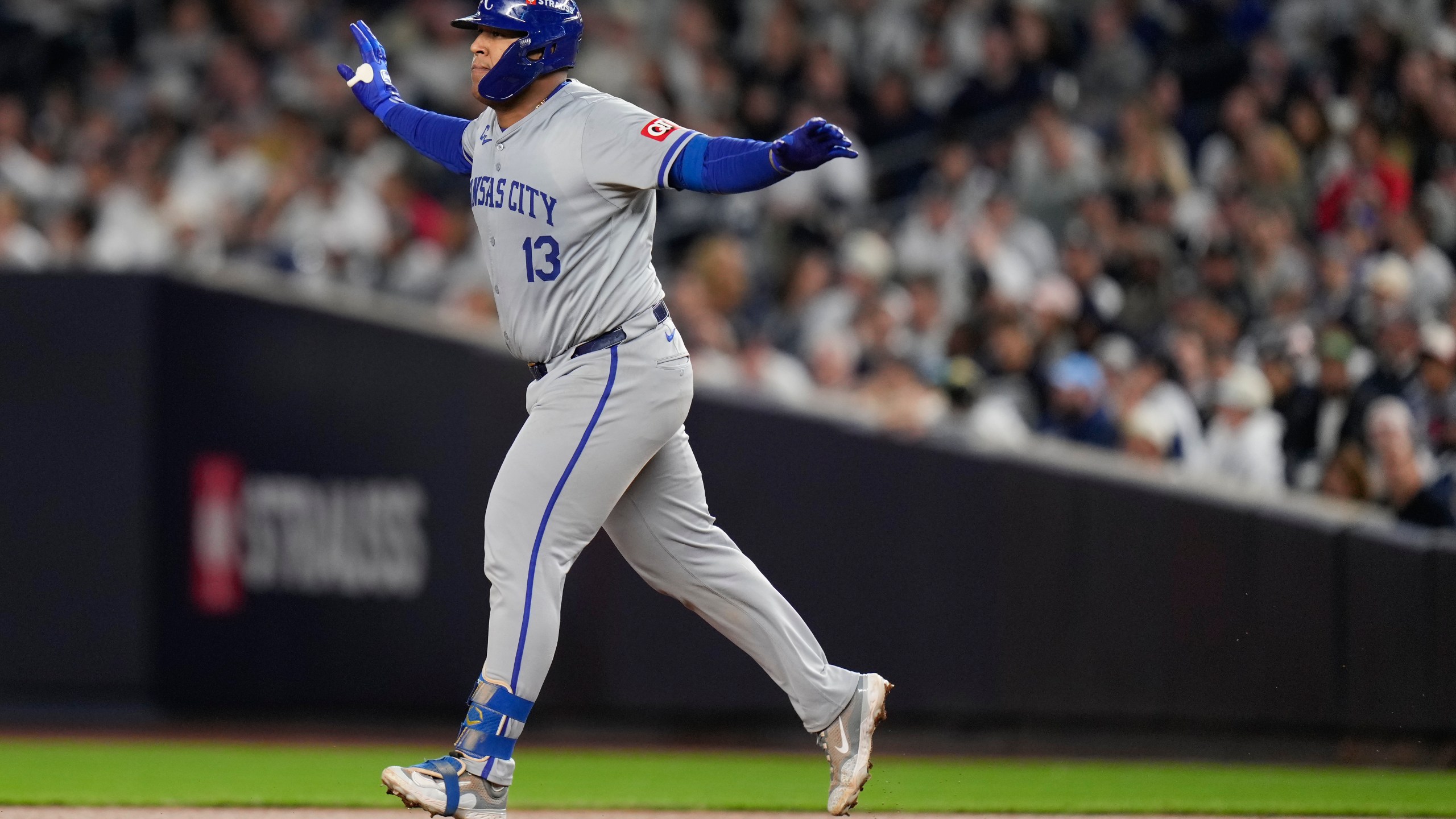 Kansas City Royals' Salvador Perez (13) reacts after hitting a solo home run against the New York Yankees during the fourth inning of Game 2 of the American League baseball playoff series, Monday, Oct. 7, 2024, in New York. (AP Photo/Seth Wenig)