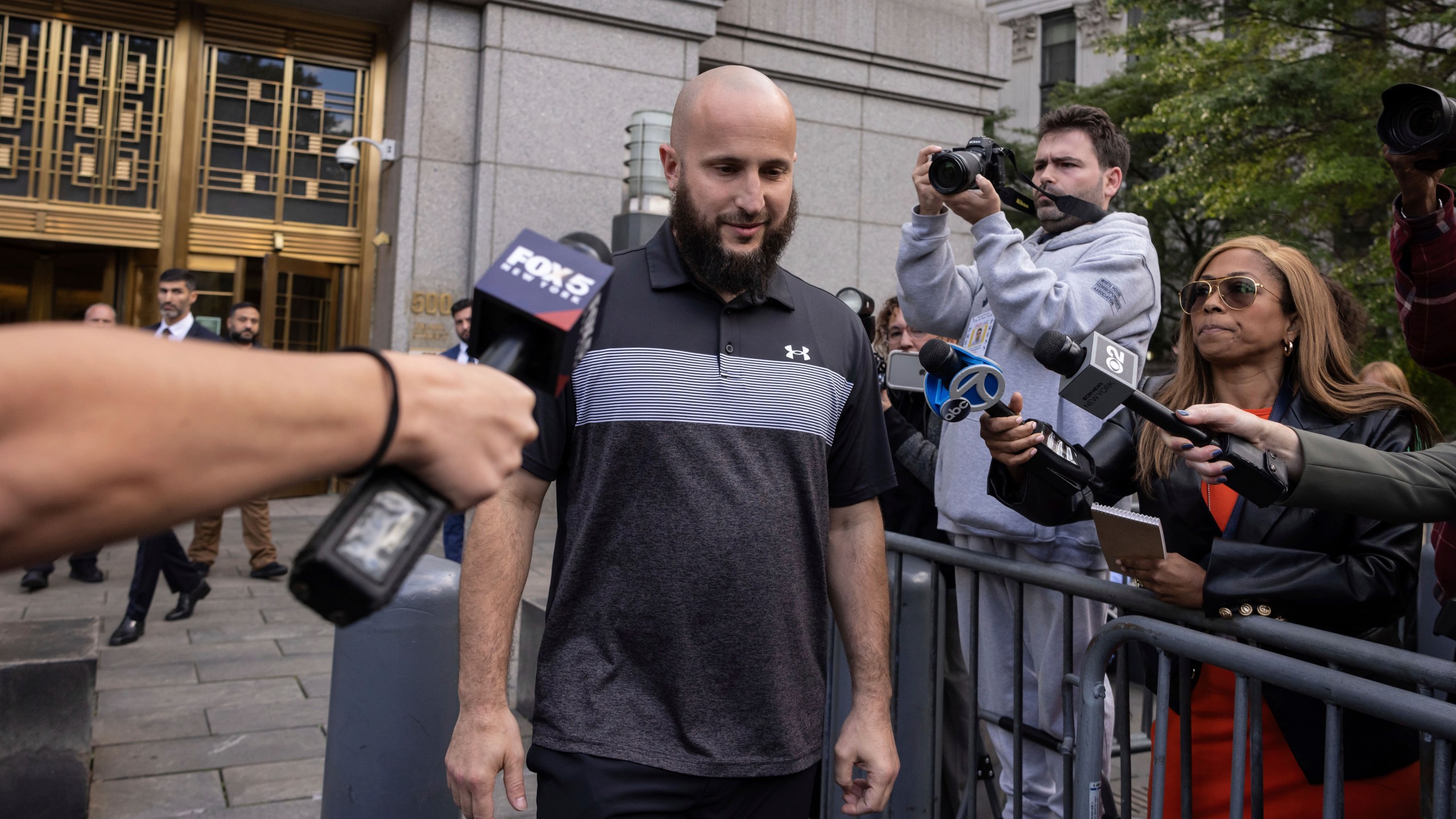 Mohamed Bahi, New York City Mayor's liaison to the Muslim community exits Manhattan Federal Court, Tuesday, Oct. 8, 2024, in New York. (AP Photo/Yuki Iwamura)