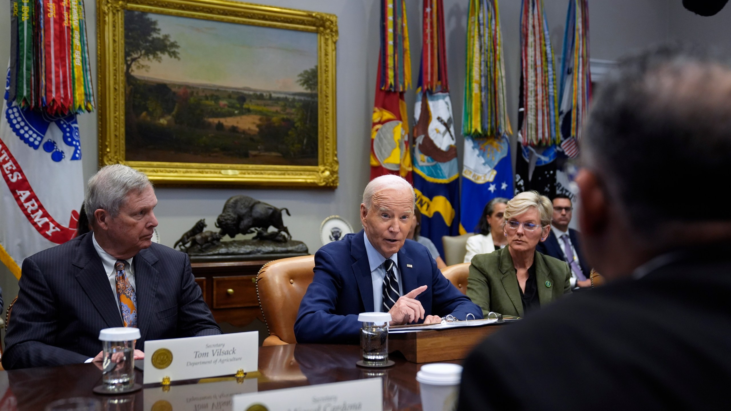 President Joe Biden delivers remarks on the federal government's response to Hurricane Helene and preparations for Hurricane Milton in the Roosevelt Room of the White House, Tuesday, Oct. 8, 2024, in Washington, as Secretary of Agriculture Tom Vilsack, left, and Secretary of Energy Jennifer Granholm, right, look on. (AP Photo/Evan Vucci)