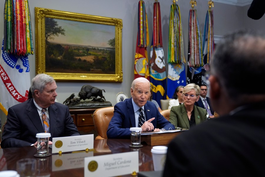 President Joe Biden delivers remarks on the federal government's response to Hurricane Helene and preparations for Hurricane Milton in the Roosevelt Room of the White House, Tuesday, Oct. 8, 2024, in Washington, as Secretary of Agriculture Tom Vilsack, left, and Secretary of Energy Jennifer Granholm, right, look on. (AP Photo/Evan Vucci)