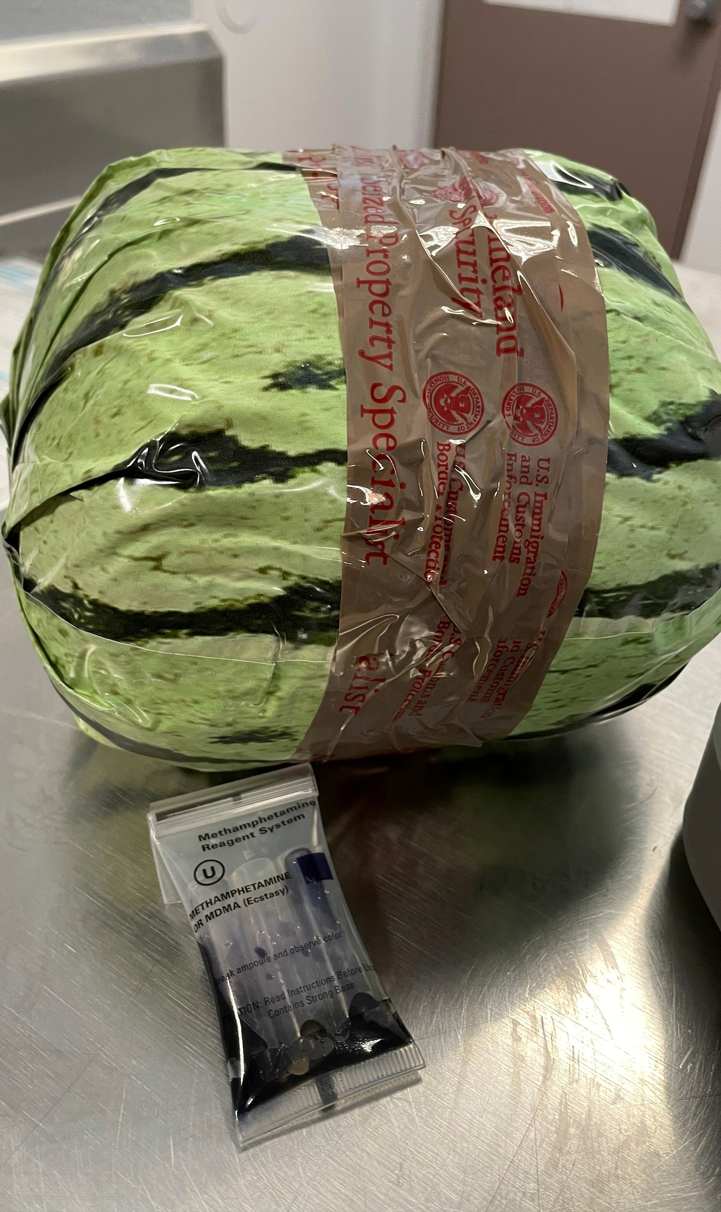 A fake watermelon, used to disguised a shipment of methamphetamines, is shown after a bust by U.S. Customs and Border Protection, Friday, Aug. 16, 2024, in Otay Mesa, Calif. (U.S. Customs and Border Protection via AP)