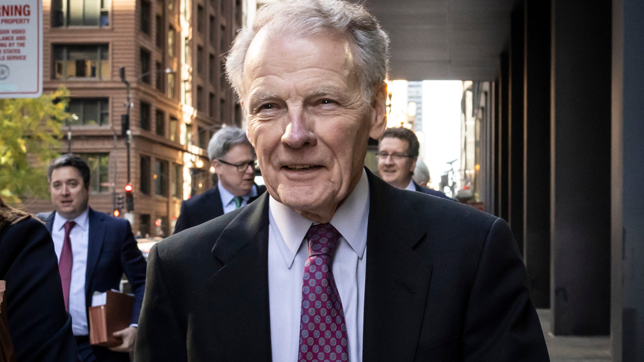 Illinois' former House Speaker Michael Madigan, charged in a multimillion-dollar racketeering and bribery scheme that included the state’s largest utility, ComEd, walks out of the Dirksen Federal Courthouse, Wednesday, Oct. 9, 2024 in Chicago. (Ashlee Rezin/Chicago Sun-Times via AP)