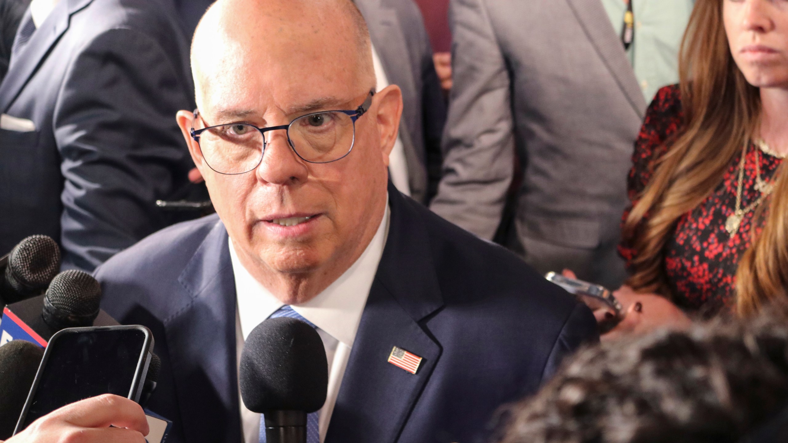 Former Maryland Gov. Larry Hogan, a Republican running for U.S. Senate in Maryland, talks to reporters after a debate with Democrat Angela Alsobrooks, Thursday, Oct. 10, 2024, in Owings Mills, Md. (AP Photo/Brian Witte)