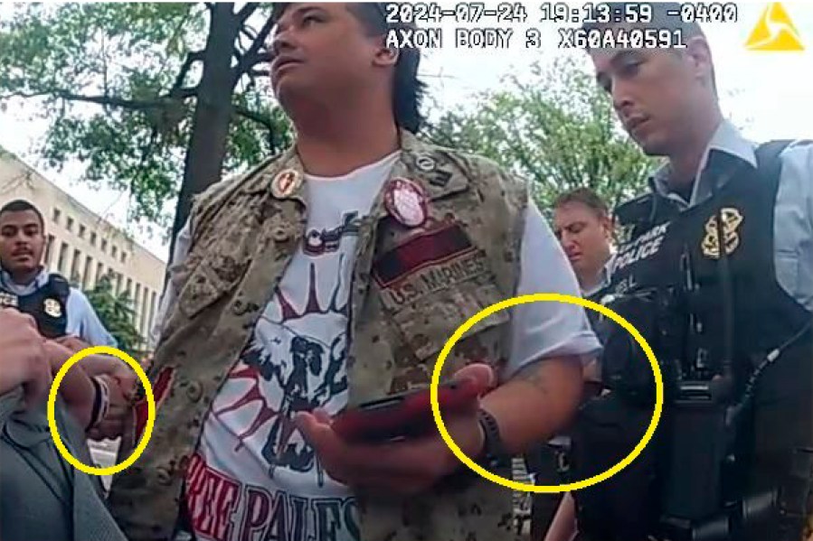 This image from police-worn body camera, and provided and annotated by the Justice Department, in the affidavit to support the criminal complaint and arrest warrant for Zachary Allen Kam, shows Kim during his arrest July 24, 2024, in Washington. (Department of Justice via AP)