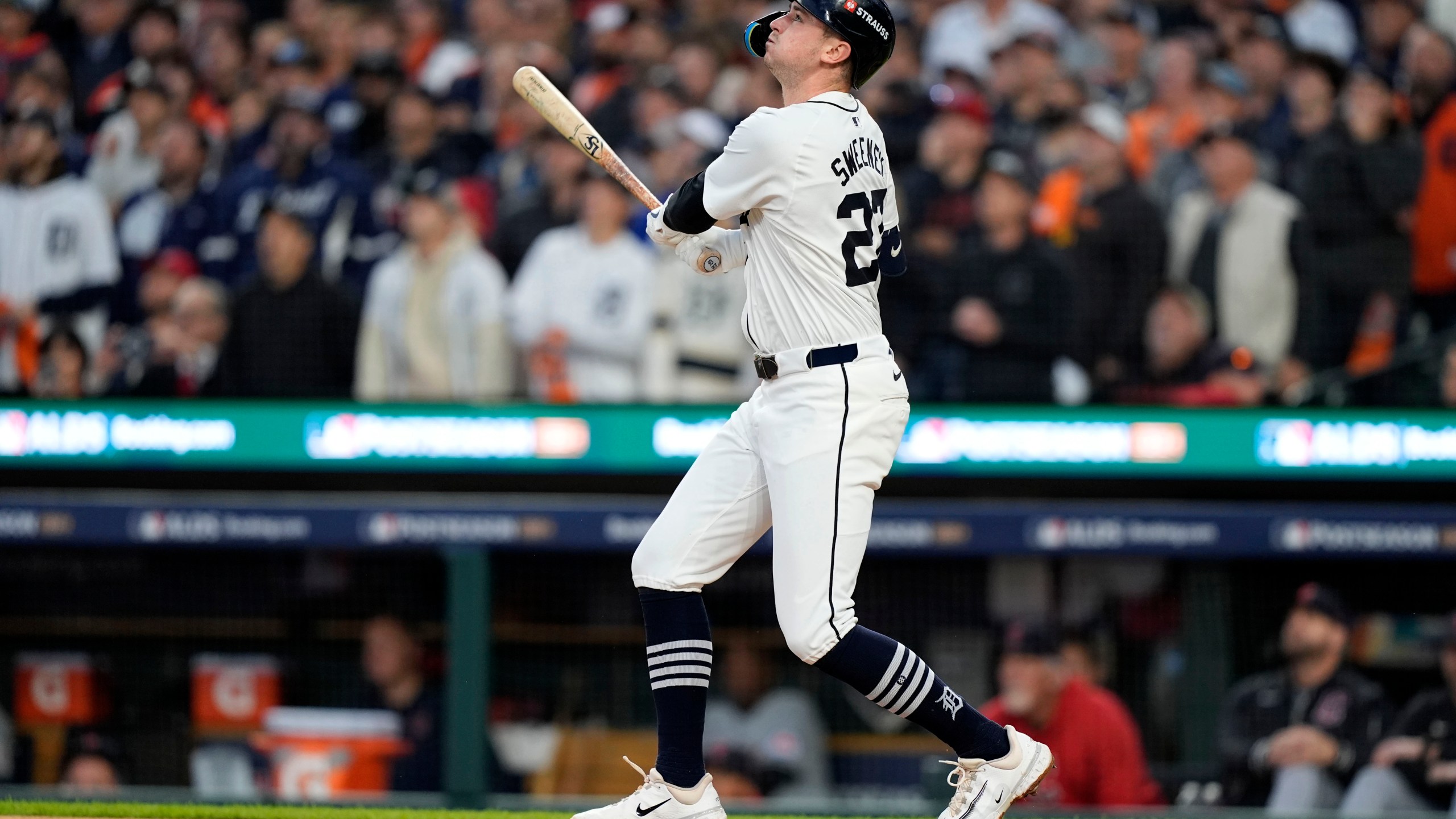 Detroit Tigers' Trey Sweeney hits an RBI sacrifice fly in the second inning during Game 4 of a baseball American League Division Series against the Cleveland Guardians, Thursday, Oct. 10, 2024, in Detroit. (AP Photo/Carlos Osorio)