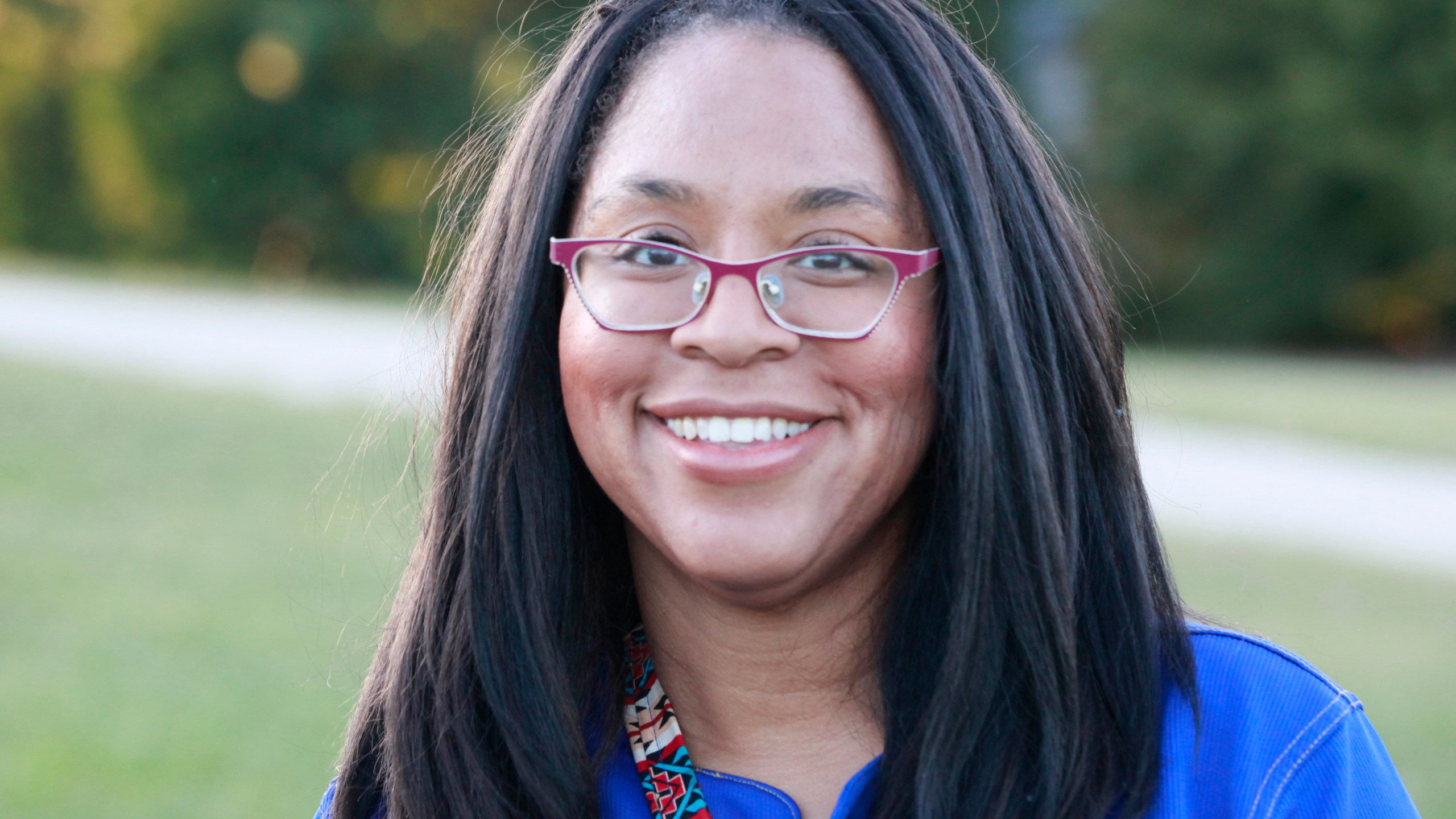 Vanessa Vaughn West, a Democratic candidate for the Kansas House, answers questions about her campaign during a break in walking-door-to-door in the neighborhood around her home, Tuesday, Oct. 1, 2024, in Shawnee, Kansas. (AP Photo/John Hanna)