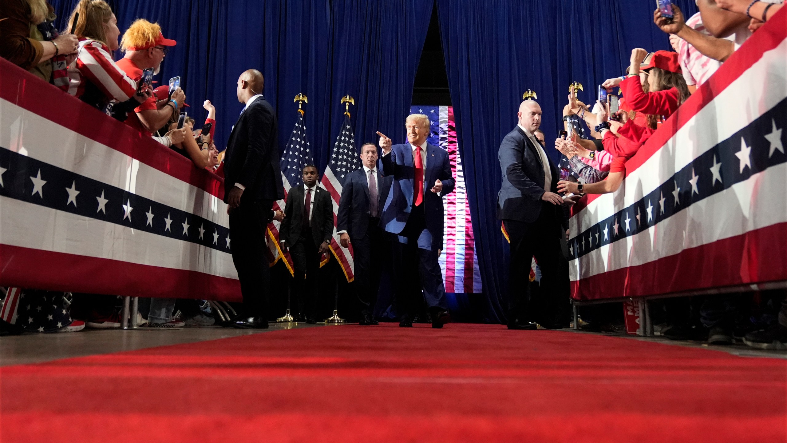 Republican presidential nominee former President Donald Trump arrives at a campaign town hall at the Greater Philadelphia Expo Center & Fairgrounds, Monday, Oct. 14, 2024, in Oaks, Pa. (AP Photo/Alex Brandon)