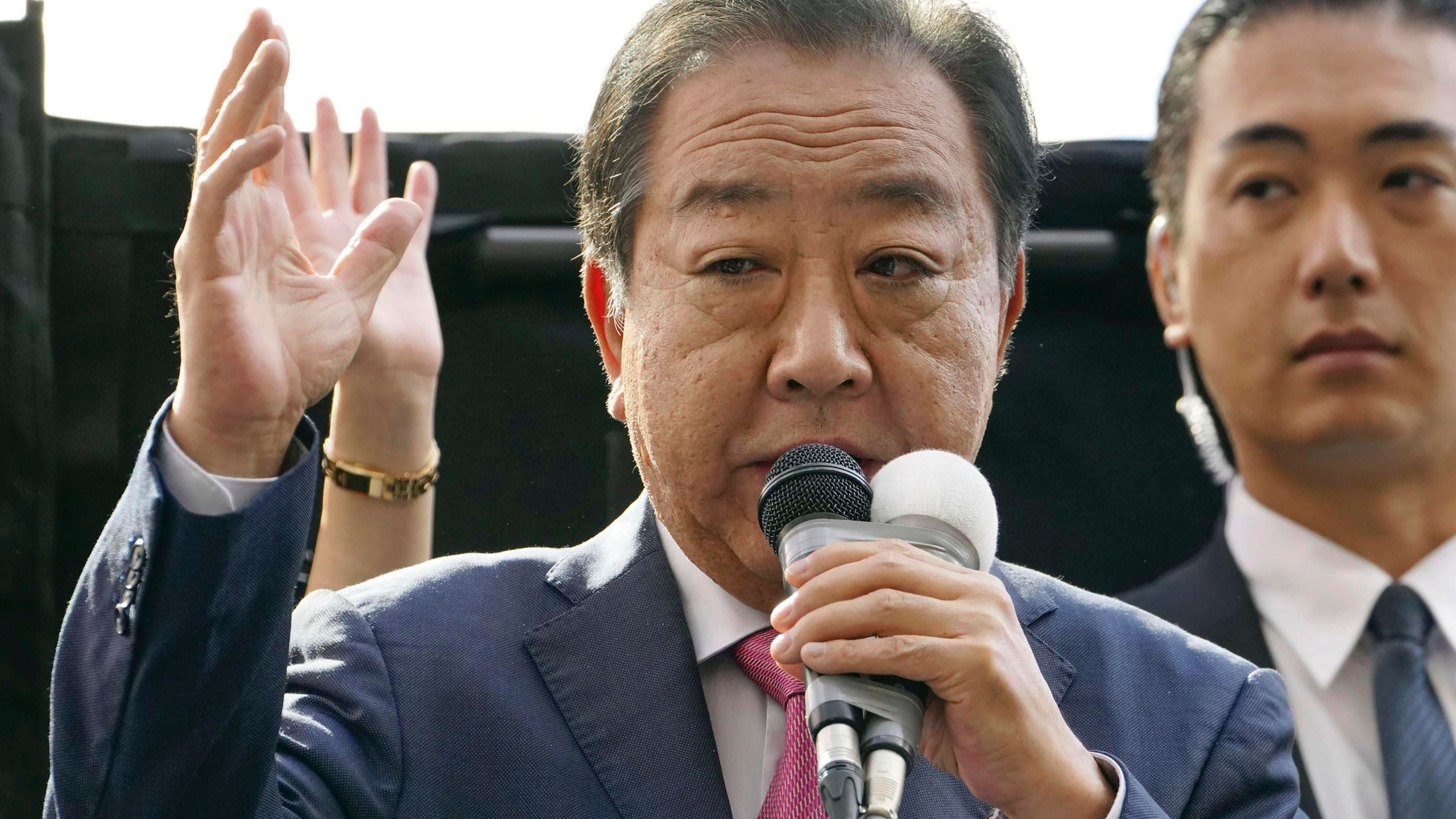 Yoshihiko Noda, leader of Japan's opposition Constitutional Democratic Party delivers a speech in Hachioji, outskirts of Tokyo as official campaigning for a parliamentary election later this month officially kicked off Tuesday, Oct. 15, 2024. (Kyodo News via AP)