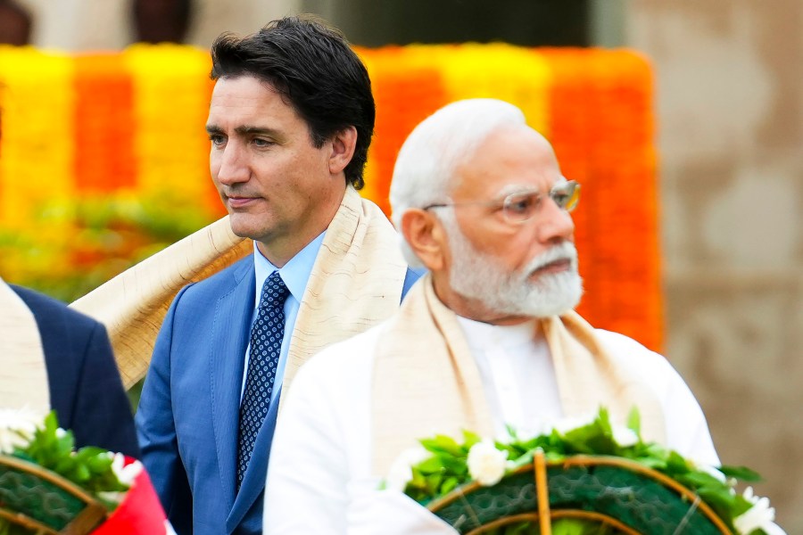 FILE - Canada's Prime Minister Justin Trudeau, left, walks past India's Prime Minister Narendra Modi as they take part in a wreath-laying ceremony at Raj Ghat, Mahatma Gandhi's cremation site, during the G20 Summit in New Delhi, Sept. 10, 2023. (Sean Kilpatrick/The Canadian Press via AP, File)