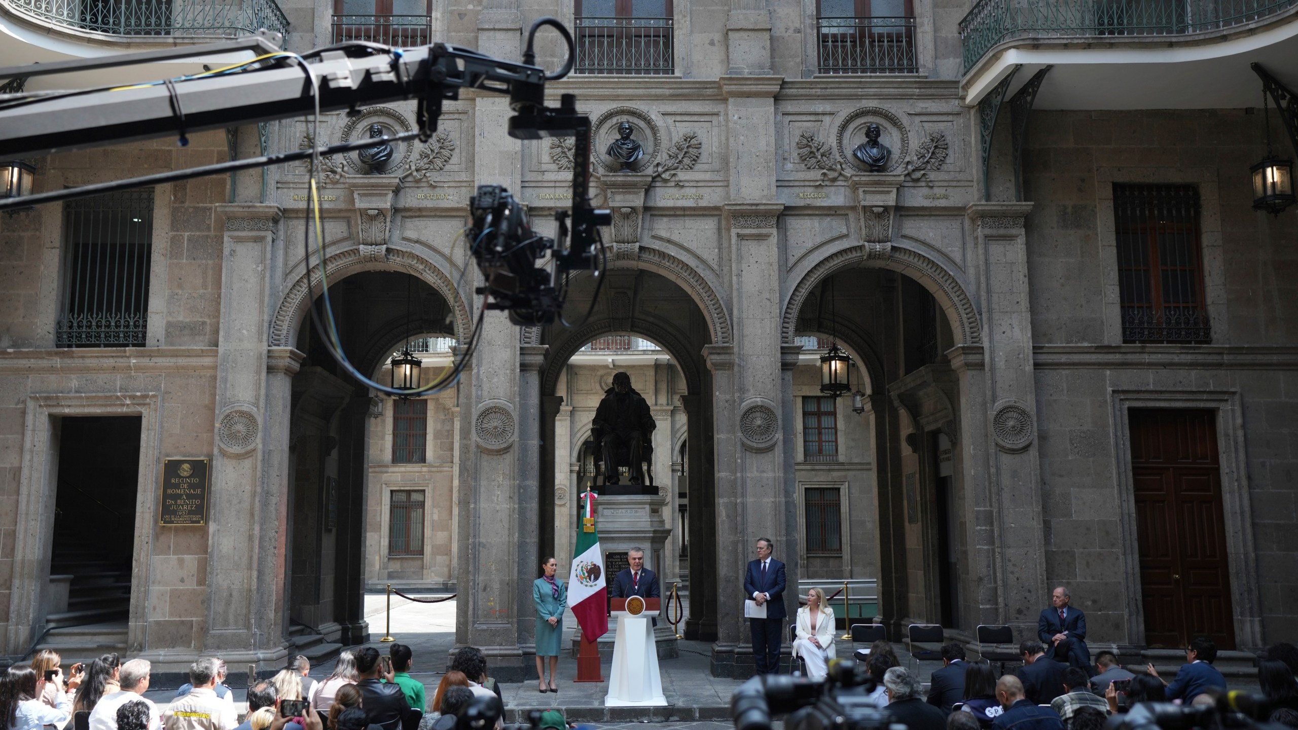 Mexican President Claudia Sheinbaum, left, listens to Mexican businessperson Francisco Cervantes speak during a news conference at the National Palace in Mexico City, Tuesday, Oct. 15, 2024. (AP Photo/Fernando Llano)