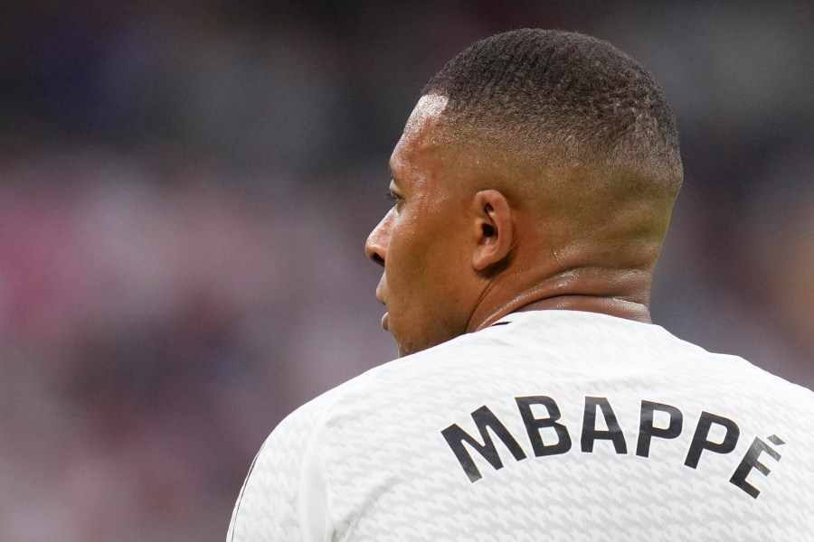 FILE - Real Madrid's Kylian Mbappe attends the Spanish La Liga soccer match between Real Madrid and Valladolid at the Santiago Bernabeu stadium in Madrid, Spain, Sunday, Aug. 25, 2024. (AP Photo/Manu Fernandez, File)